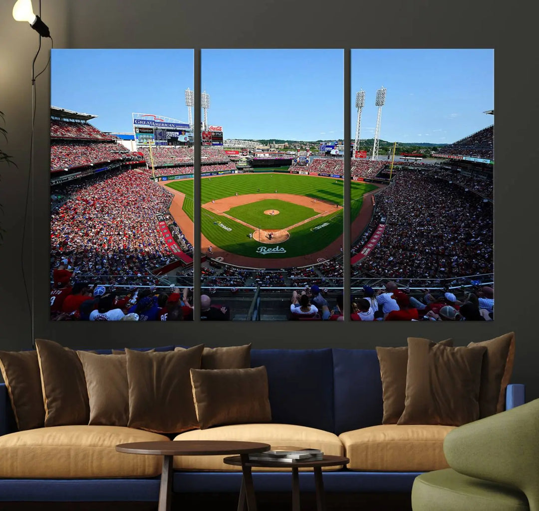 Wall art showcasing the Cincinnati Reds Baseball Team Print features a panoramic view of a bustling Great American Ball Park Stadium on a gallery-quality canvas.