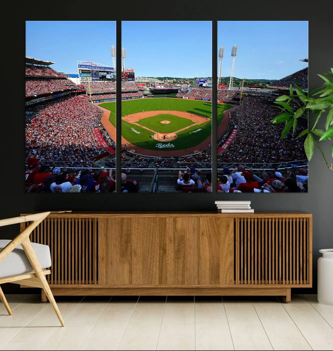 Wall art showcasing the Cincinnati Reds Baseball Team Print features a panoramic view of a bustling Great American Ball Park Stadium on a gallery-quality canvas.