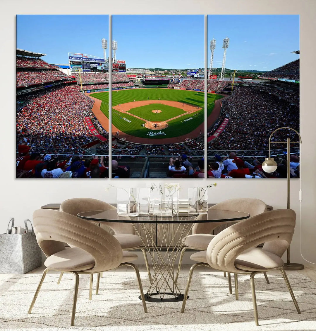 Wall art showcasing the Cincinnati Reds Baseball Team Print features a panoramic view of a bustling Great American Ball Park Stadium on a gallery-quality canvas.