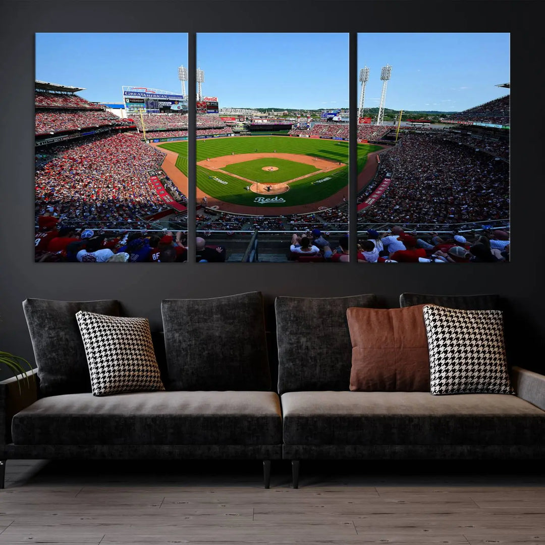 Wall art showcasing the Cincinnati Reds Baseball Team Print features a panoramic view of a bustling Great American Ball Park Stadium on a gallery-quality canvas.