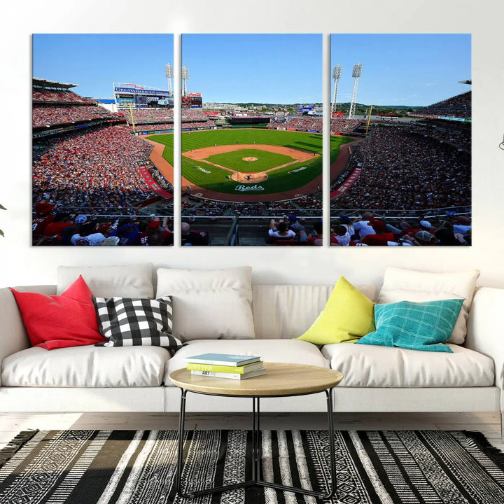 Wall art showcasing the Cincinnati Reds Baseball Team Print features a panoramic view of a bustling Great American Ball Park Stadium on a gallery-quality canvas.