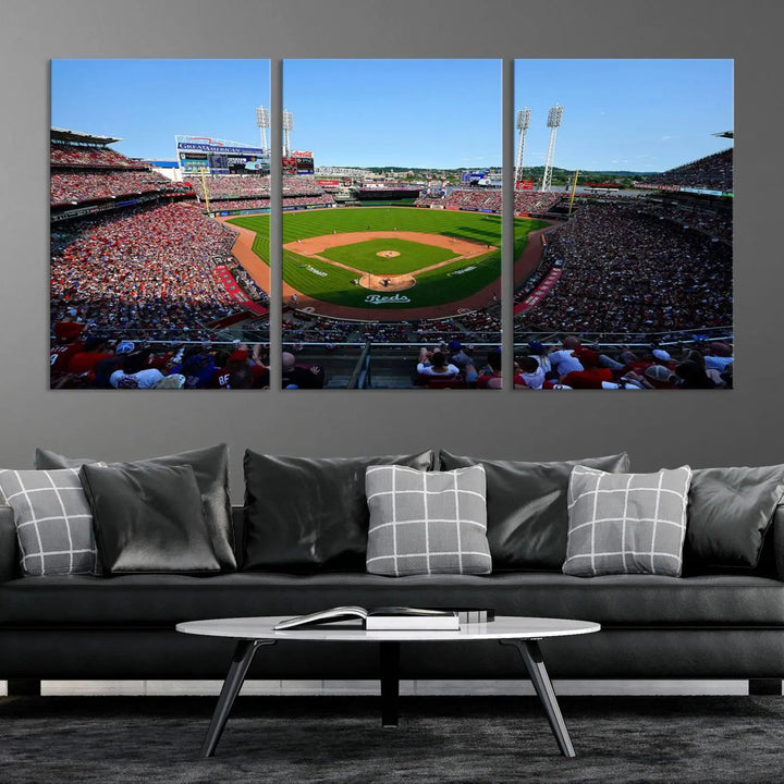 Wall art showcasing the Cincinnati Reds Baseball Team Print features a panoramic view of a bustling Great American Ball Park Stadium on a gallery-quality canvas.