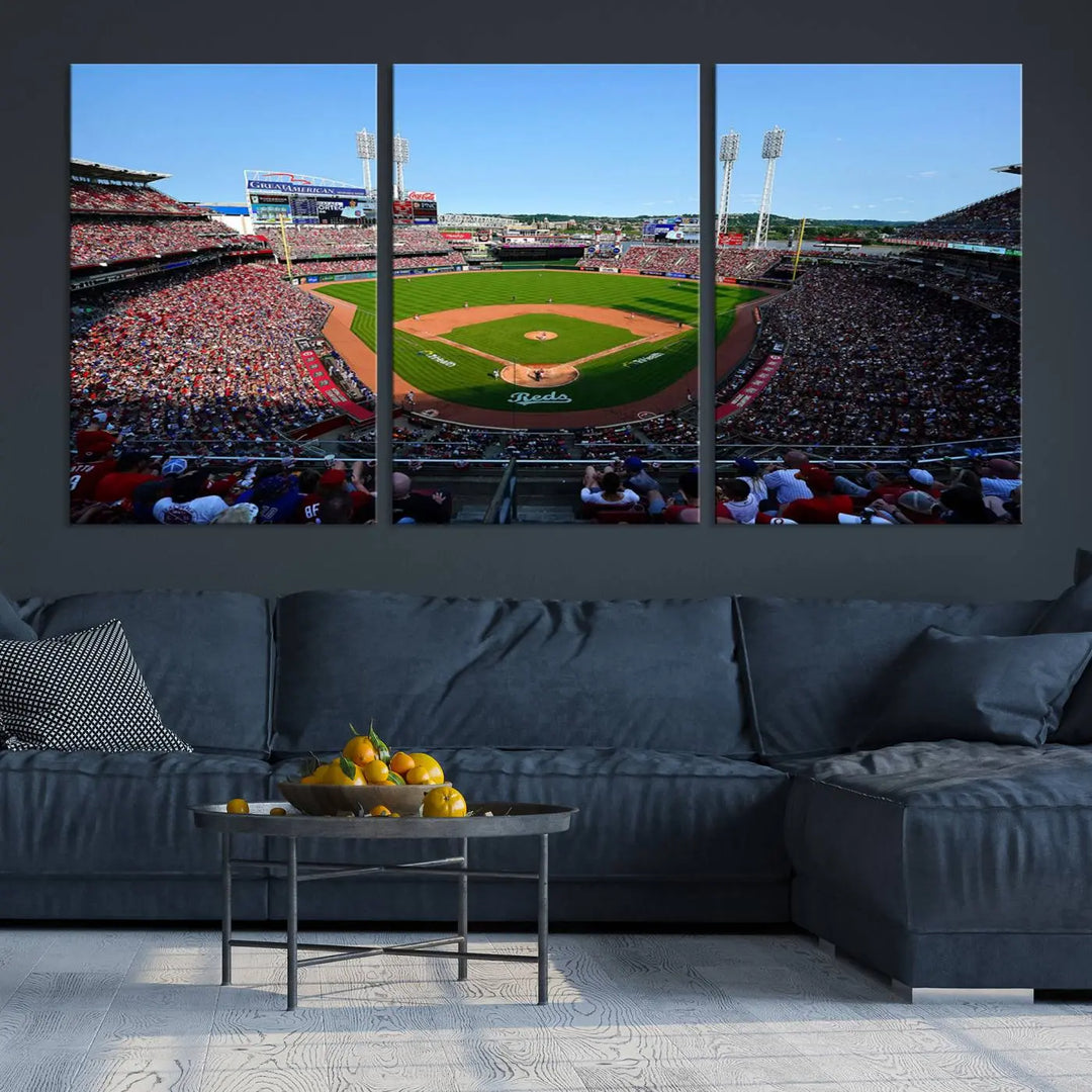 Wall art showcasing the Cincinnati Reds Baseball Team Print features a panoramic view of a bustling Great American Ball Park Stadium on a gallery-quality canvas.