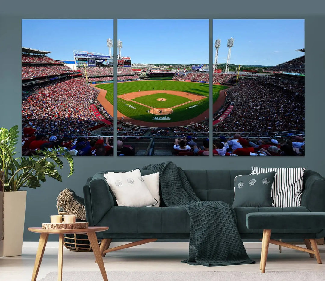 Wall art showcasing the Cincinnati Reds Baseball Team Print features a panoramic view of a bustling Great American Ball Park Stadium on a gallery-quality canvas.