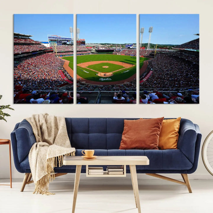 Wall art showcasing the Cincinnati Reds Baseball Team Print features a panoramic view of a bustling Great American Ball Park Stadium on a gallery-quality canvas.