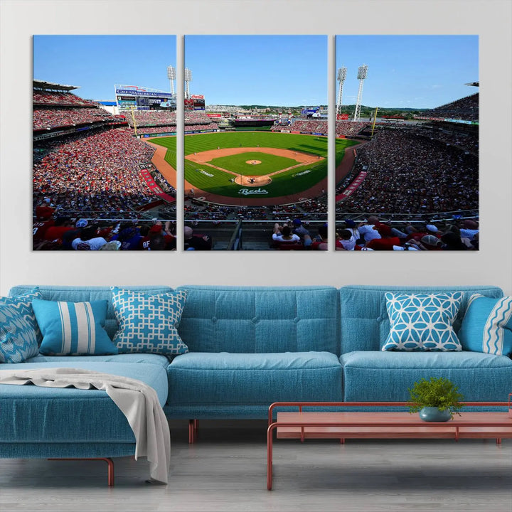 Wall art showcasing the Cincinnati Reds Baseball Team Print features a panoramic view of a bustling Great American Ball Park Stadium on a gallery-quality canvas.