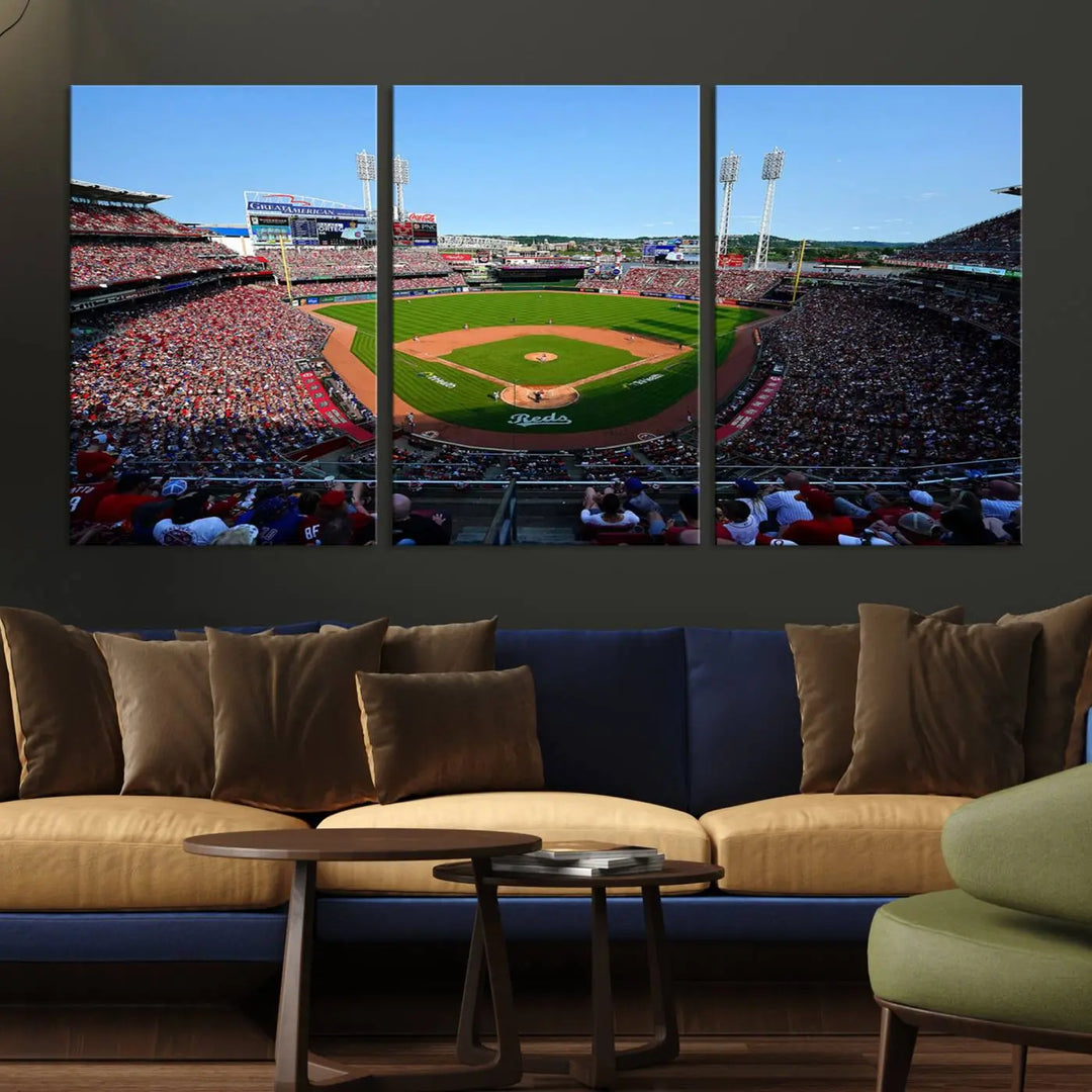 Wall art showcasing the Cincinnati Reds Baseball Team Print features a panoramic view of a bustling Great American Ball Park Stadium on a gallery-quality canvas.