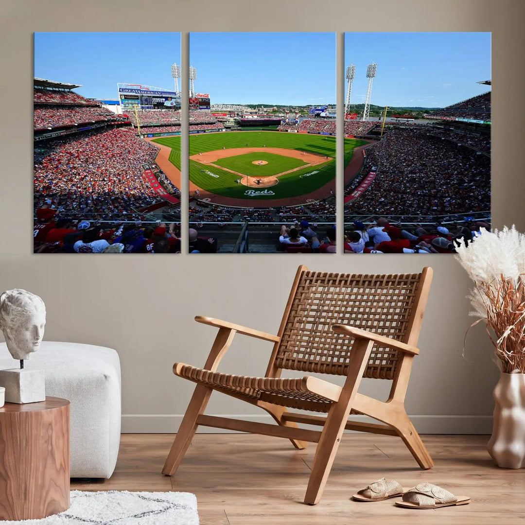 Wall art showcasing the Cincinnati Reds Baseball Team Print features a panoramic view of a bustling Great American Ball Park Stadium on a gallery-quality canvas.