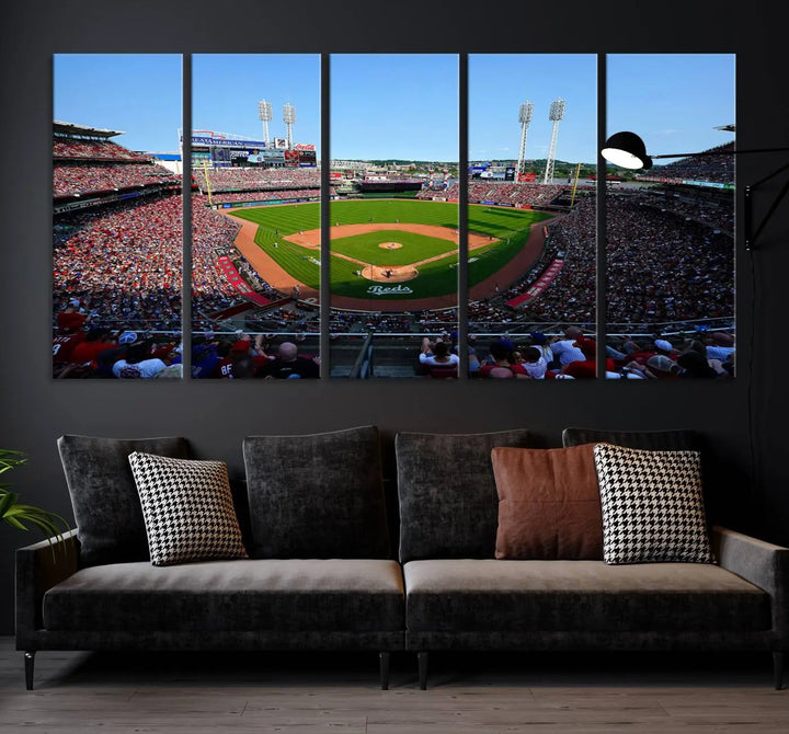 Wall art showcasing the Cincinnati Reds Baseball Team Print features a panoramic view of a bustling Great American Ball Park Stadium on a gallery-quality canvas.