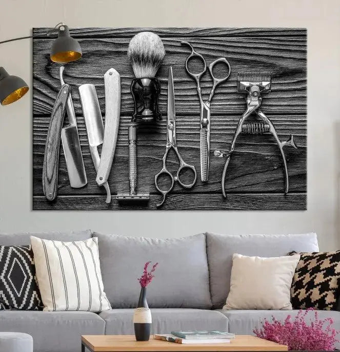 The Classic Barber Tools Wall Art Canvas Print beautifully showcases a triptych of traditional barbering essentials, such as shaving tools and scissors, set against a wooden background. This print captures the timeless charm of barber tools wall art perfectly.