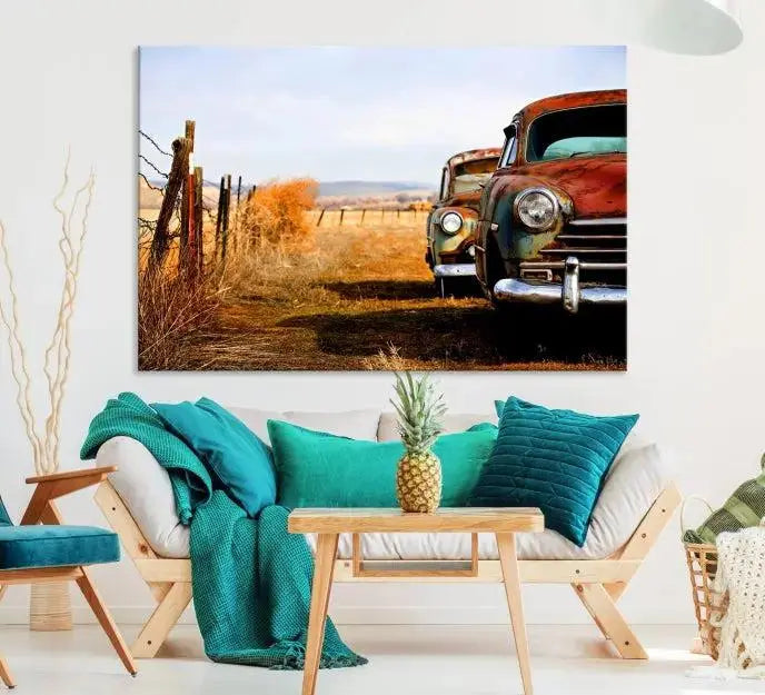 The Classic Cars Vintage Wall Art Canvas Print, featuring a triptych of vintage cars in a rural landscape and gallery wrapped on museum-quality polycotton, elegantly hangs on the wall.