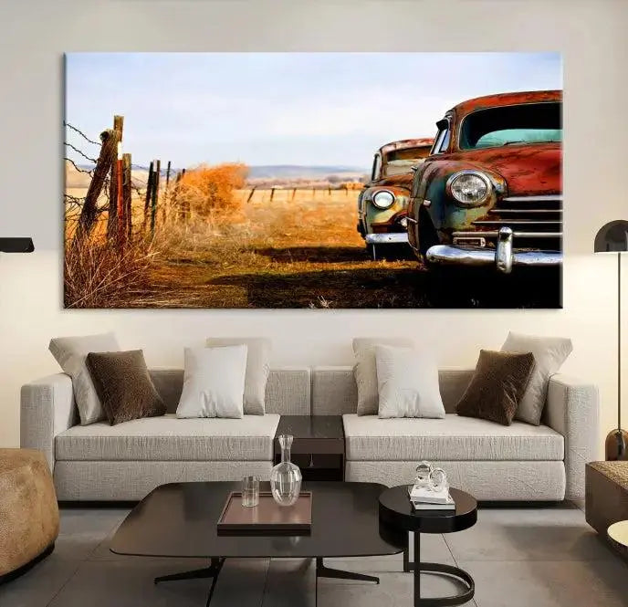 The Classic Cars Vintage Wall Art Canvas Print, featuring a triptych of vintage cars in a rural landscape and gallery wrapped on museum-quality polycotton, elegantly hangs on the wall.