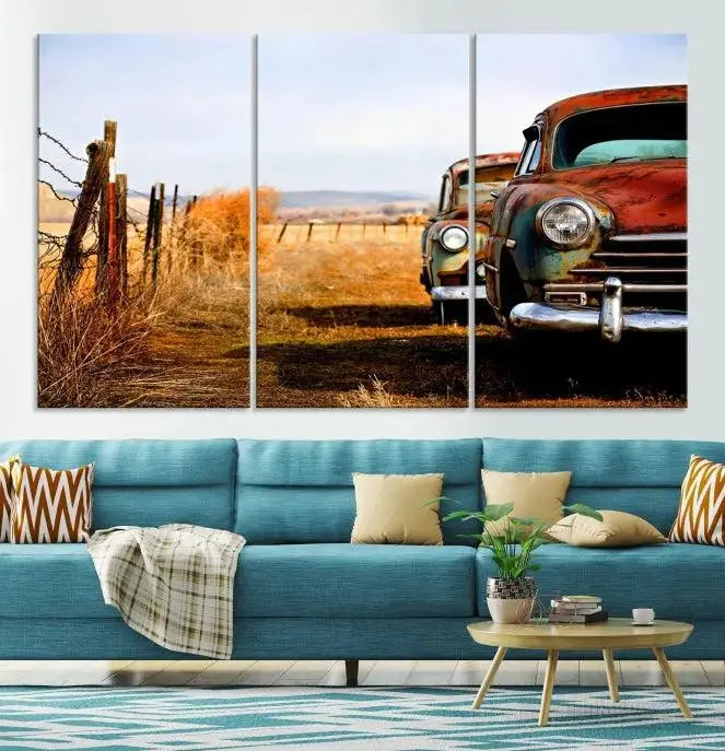 The Classic Cars Vintage Wall Art Canvas Print, featuring a triptych of vintage cars in a rural landscape and gallery wrapped on museum-quality polycotton, elegantly hangs on the wall.