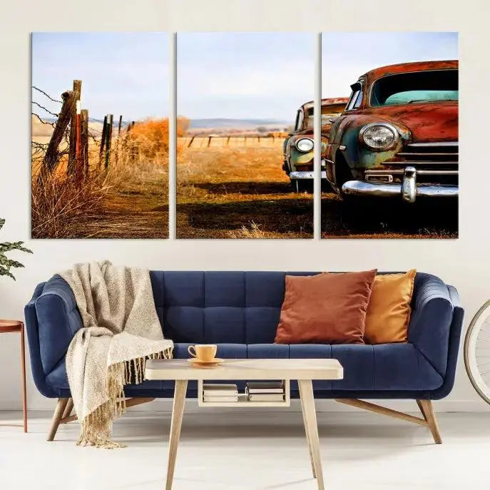 The Classic Cars Vintage Wall Art Canvas Print, featuring a triptych of vintage cars in a rural landscape and gallery wrapped on museum-quality polycotton, elegantly hangs on the wall.