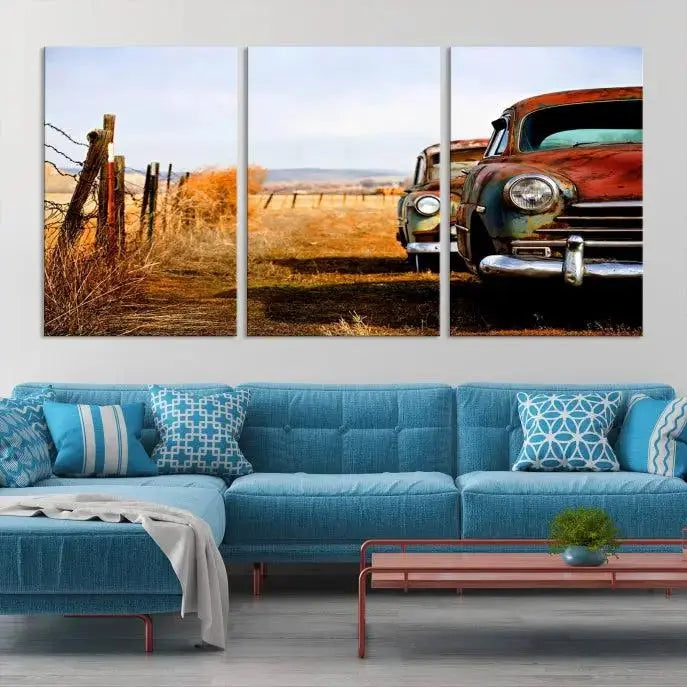 The Classic Cars Vintage Wall Art Canvas Print, featuring a triptych of vintage cars in a rural landscape and gallery wrapped on museum-quality polycotton, elegantly hangs on the wall.