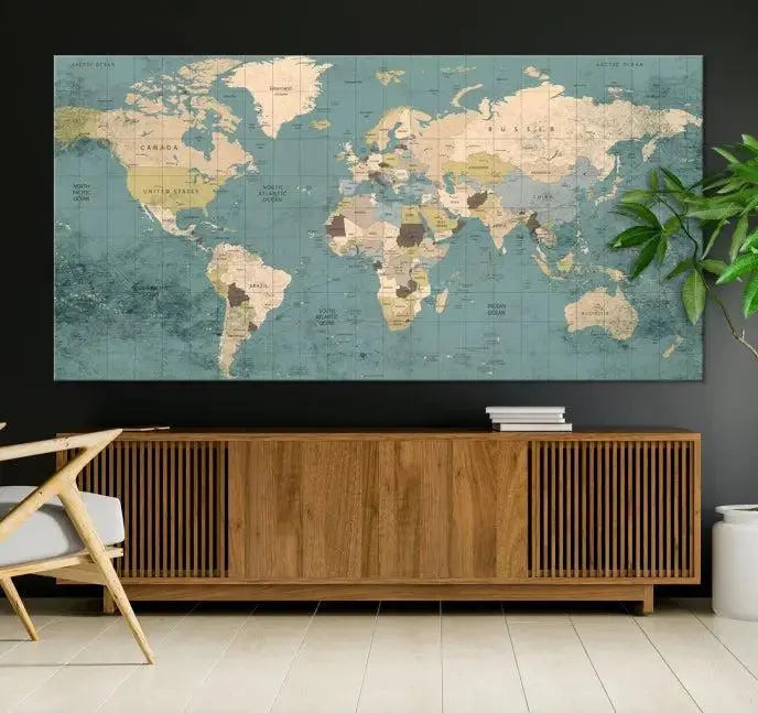 A beautiful display showcases the Classic World Map Wall Art Canvas Print in three panels. These museum-quality canvases are gallery wrapped and come with a UV-protective coating to ensure long-lasting beauty.