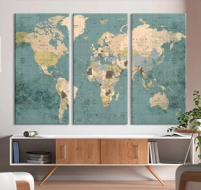 A beautiful display showcases the Classic World Map Wall Art Canvas Print in three panels. These museum-quality canvases are gallery wrapped and come with a UV-protective coating to ensure long-lasting beauty.