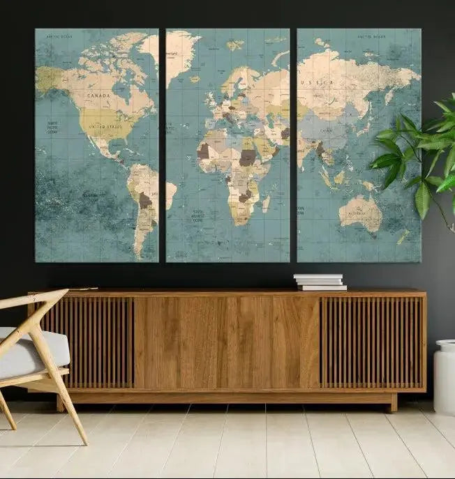 A beautiful display showcases the Classic World Map Wall Art Canvas Print in three panels. These museum-quality canvases are gallery wrapped and come with a UV-protective coating to ensure long-lasting beauty.