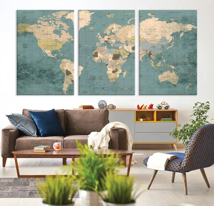 A beautiful display showcases the Classic World Map Wall Art Canvas Print in three panels. These museum-quality canvases are gallery wrapped and come with a UV-protective coating to ensure long-lasting beauty.