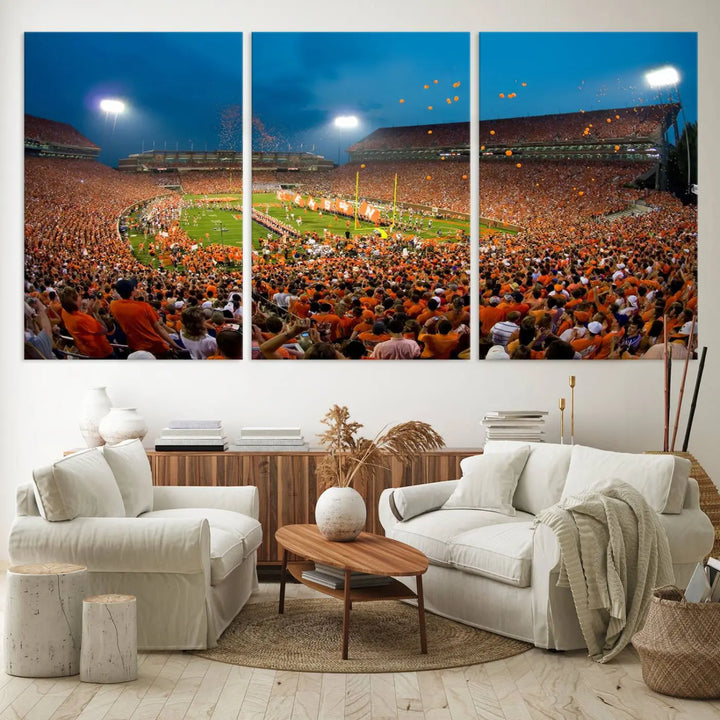 Imagine a stunning wall art canvas that captures the excitement and energy of a large football stadium packed with fans donned in orange. This Clemson University Tigers Football Team Print showcases Clemson Memorial Stadium under vibrant lights, transforming history into an enduring masterpiece.