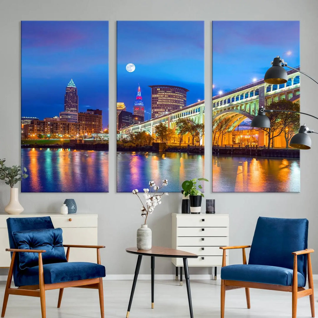 Dining room featuring a Cleveland Night Skyline Wall Art Cityscape Canvas Print with a lit-up bridge reflecting in the water.