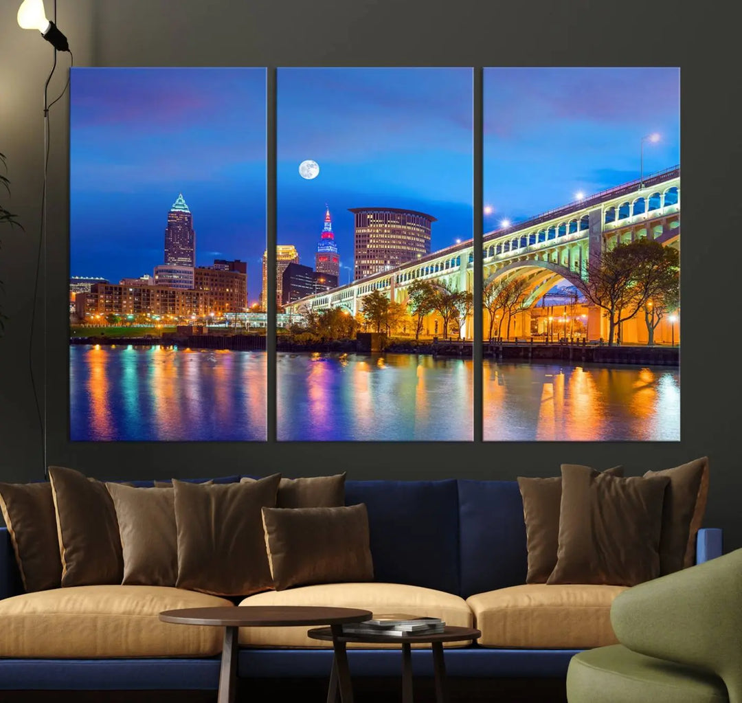 Dining room featuring a Cleveland Night Skyline Wall Art Cityscape Canvas Print with a lit-up bridge reflecting in the water.