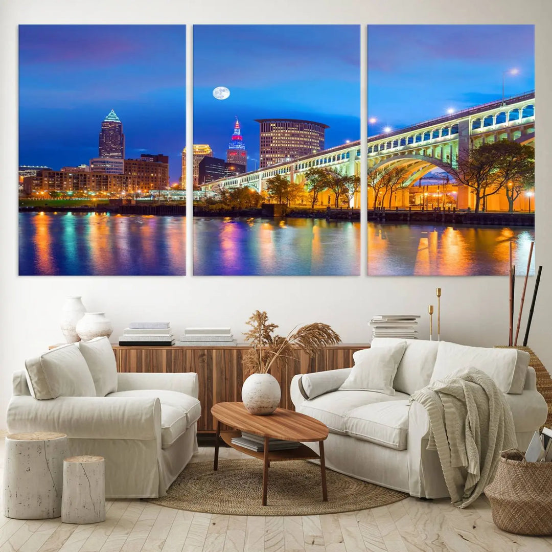 Dining room featuring a Cleveland Night Skyline Wall Art Cityscape Canvas Print with a lit-up bridge reflecting in the water.