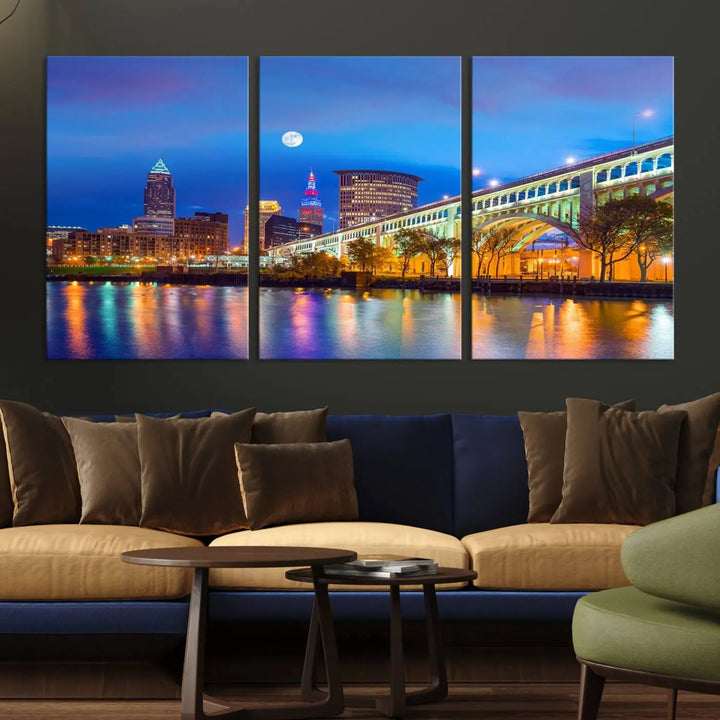 Dining room featuring a Cleveland Night Skyline Wall Art Cityscape Canvas Print with a lit-up bridge reflecting in the water.