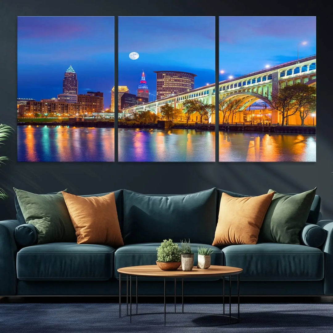 Dining room featuring a Cleveland Night Skyline Wall Art Cityscape Canvas Print with a lit-up bridge reflecting in the water.