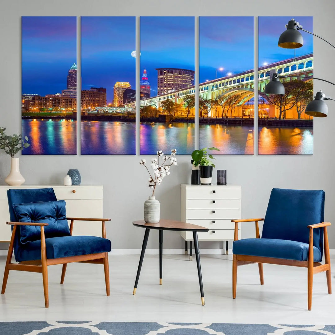 Dining room featuring a Cleveland Night Skyline Wall Art Cityscape Canvas Print with a lit-up bridge reflecting in the water.