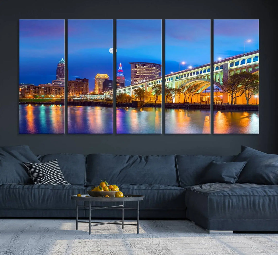 Dining room featuring a Cleveland Night Skyline Wall Art Cityscape Canvas Print with a lit-up bridge reflecting in the water.