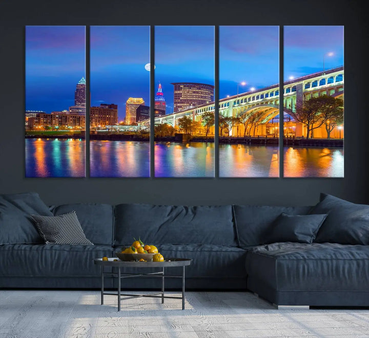 Dining room featuring a Cleveland Night Skyline Wall Art Cityscape Canvas Print with a lit-up bridge reflecting in the water.