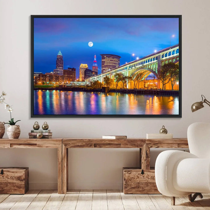 Dining room featuring a Cleveland Night Skyline Wall Art Cityscape Canvas Print with a lit-up bridge reflecting in the water.