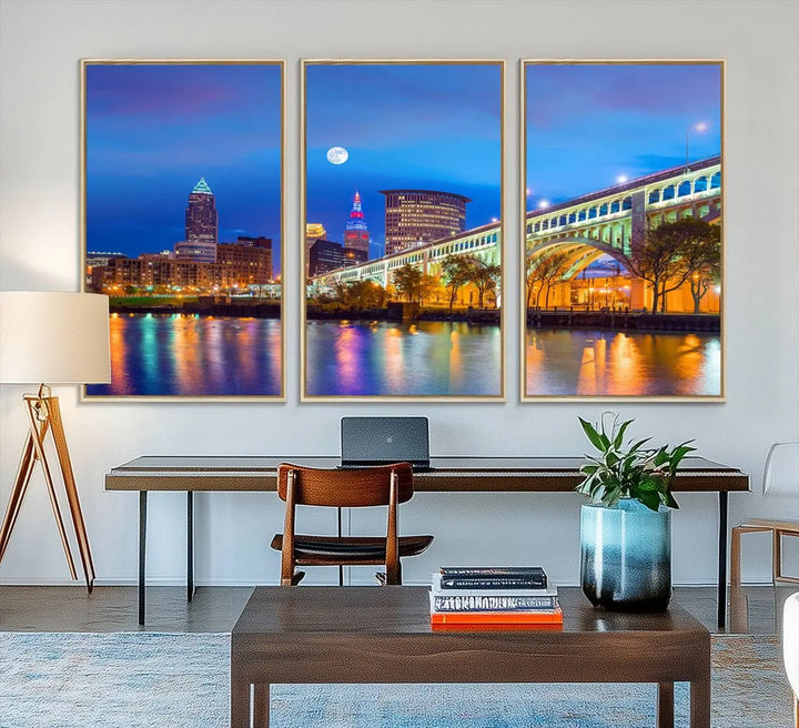 Dining room featuring a Cleveland Night Skyline Wall Art Cityscape Canvas Print with a lit-up bridge reflecting in the water.