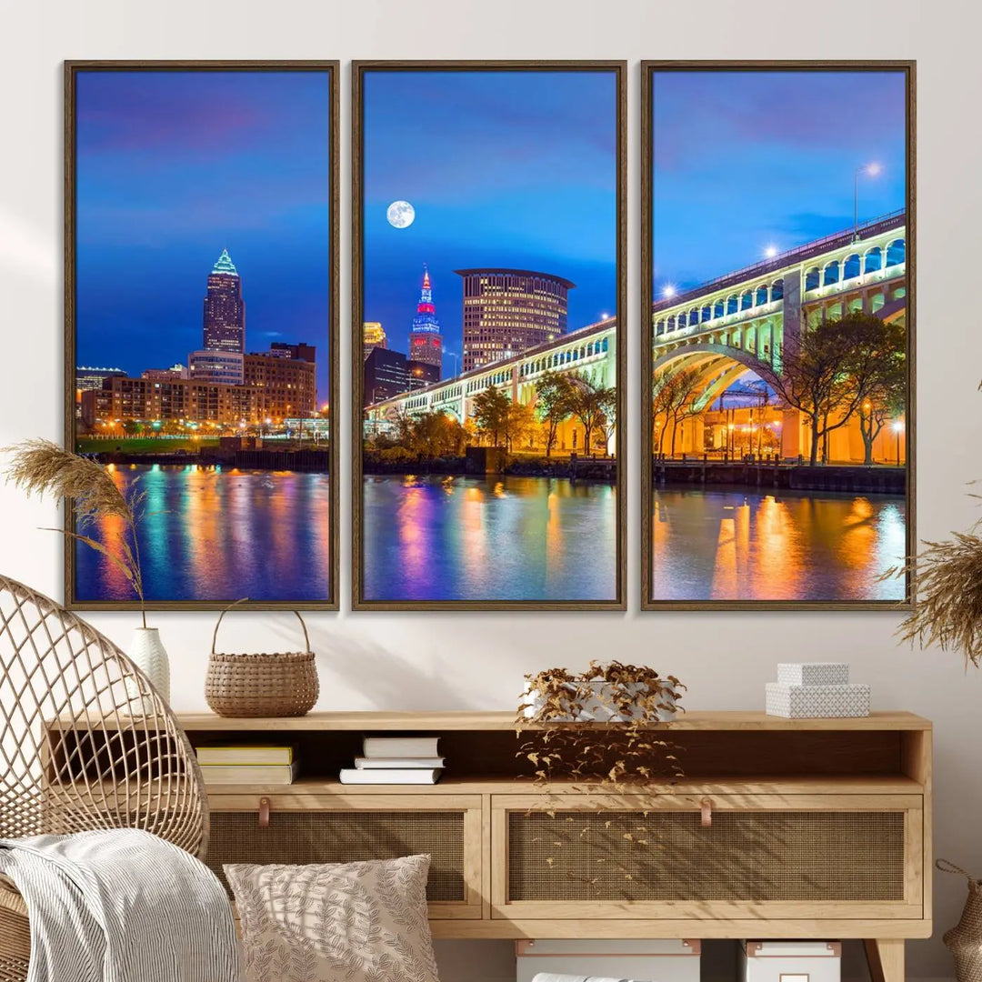 Dining room featuring a Cleveland Night Skyline Wall Art Cityscape Canvas Print with a lit-up bridge reflecting in the water.