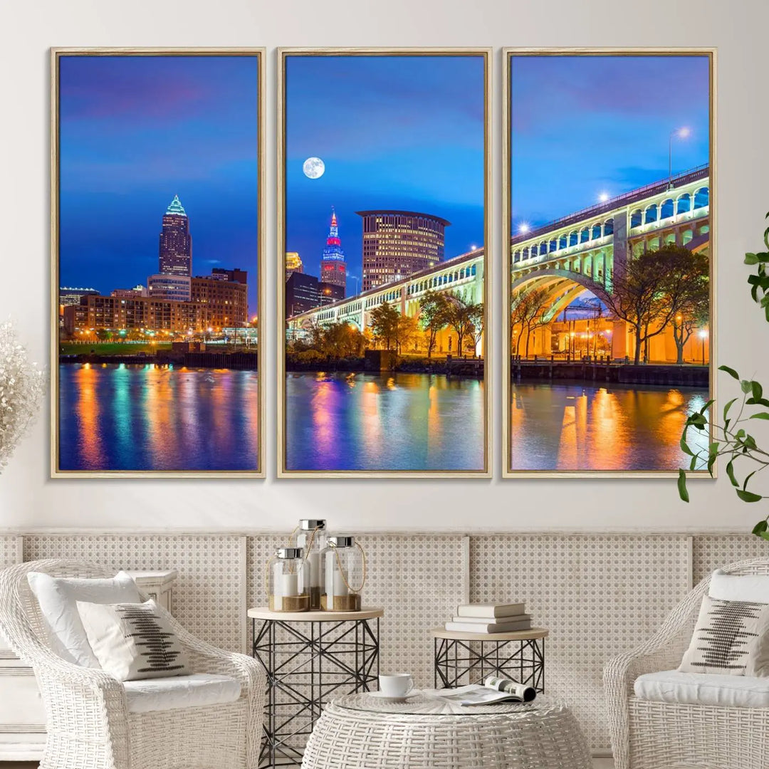 Dining room featuring a Cleveland Night Skyline Wall Art Cityscape Canvas Print with a lit-up bridge reflecting in the water.