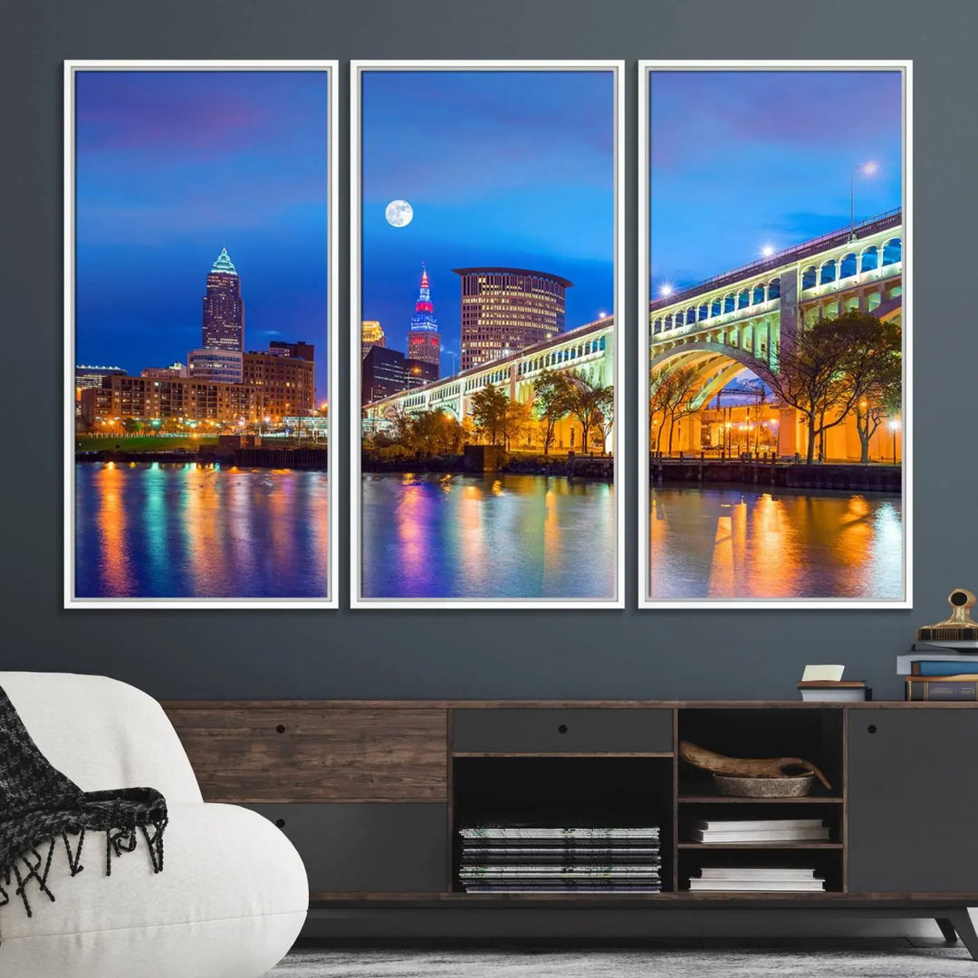 Dining room featuring a Cleveland Night Skyline Wall Art Cityscape Canvas Print with a lit-up bridge reflecting in the water.