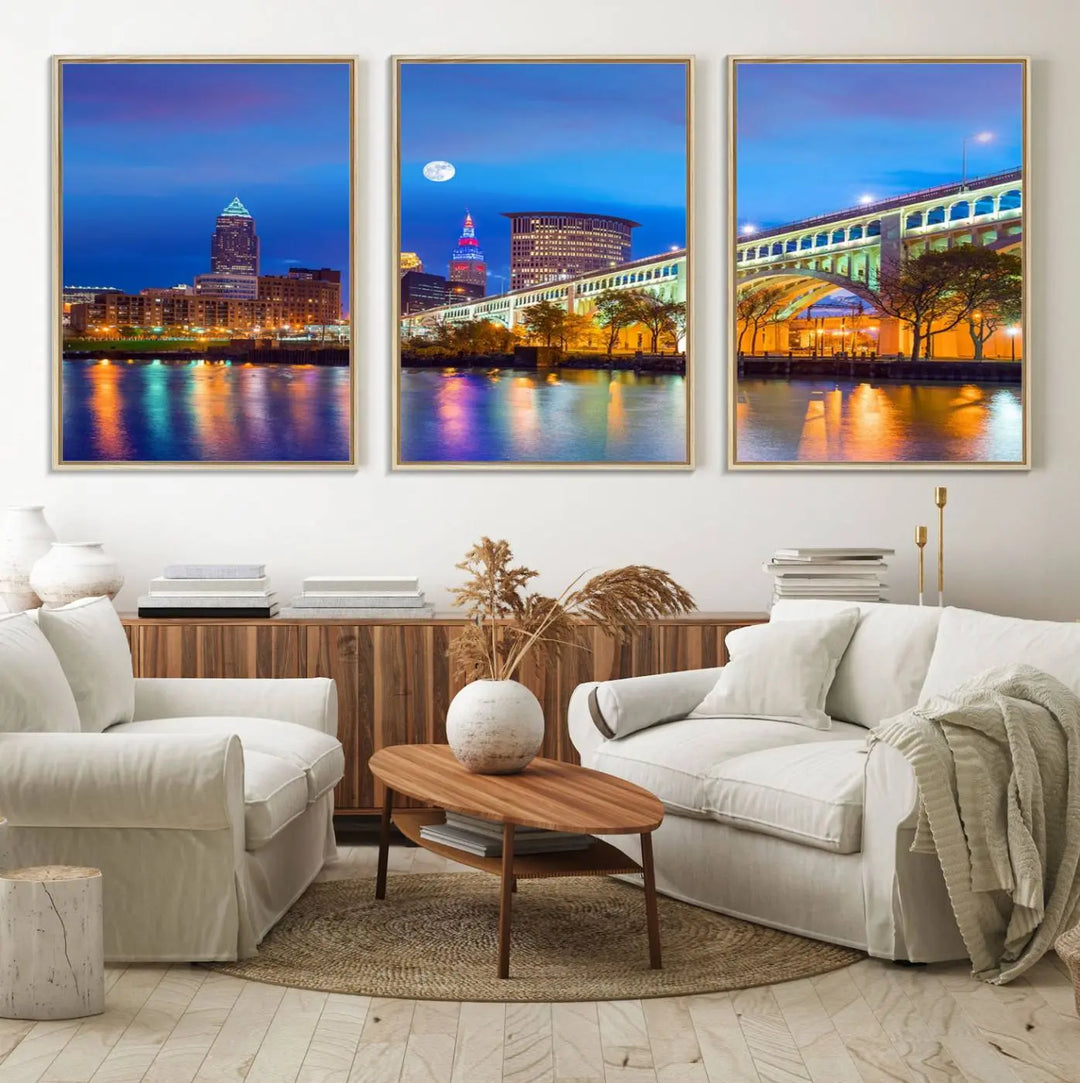 Dining room featuring a Cleveland Night Skyline Wall Art Cityscape Canvas Print with a lit-up bridge reflecting in the water.