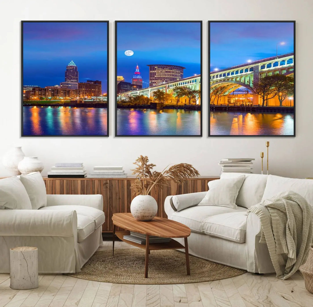 Dining room featuring a Cleveland Night Skyline Wall Art Cityscape Canvas Print with a lit-up bridge reflecting in the water.