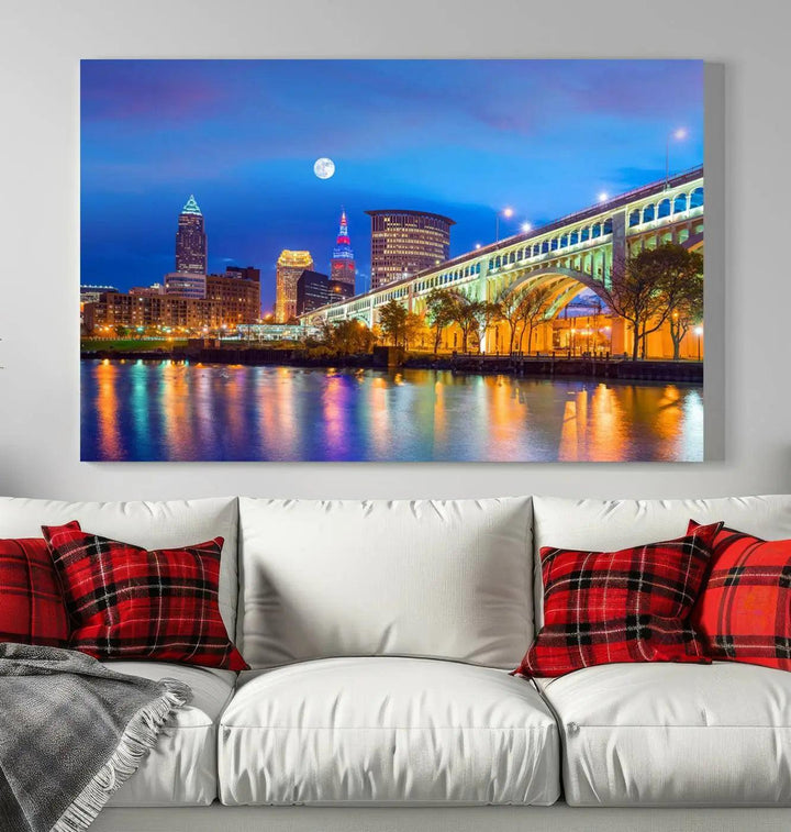 The Cleveland Night Skyline Wall Art City Cityscape Canvas Print portrays a city skyline and bridge lit up against the night sky. This artwork is printed on museum-quality canvas with a gallery-wrapped finish and features a UV-protective coating to ensure lasting vibrancy.