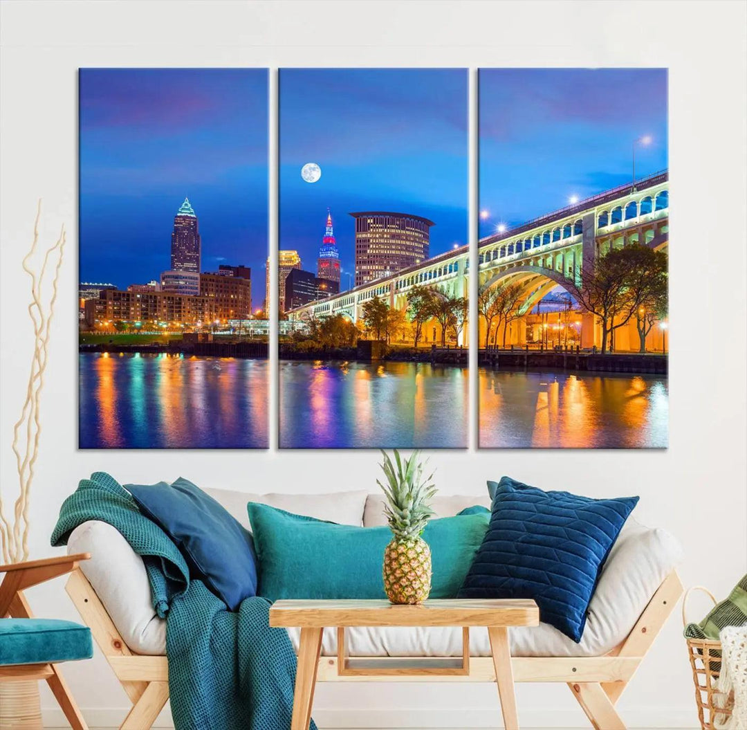 The Cleveland Night Skyline Wall Art City Cityscape Canvas Print portrays a city skyline and bridge lit up against the night sky. This artwork is printed on museum-quality canvas with a gallery-wrapped finish and features a UV-protective coating to ensure lasting vibrancy.