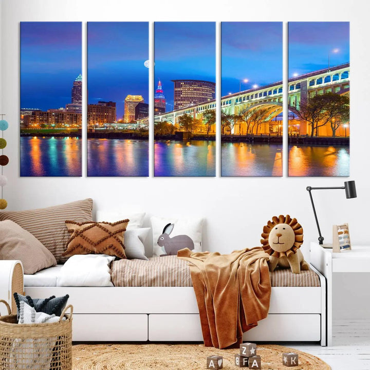 The Cleveland Night Skyline Wall Art City Cityscape Canvas Print portrays a city skyline and bridge lit up against the night sky. This artwork is printed on museum-quality canvas with a gallery-wrapped finish and features a UV-protective coating to ensure lasting vibrancy.