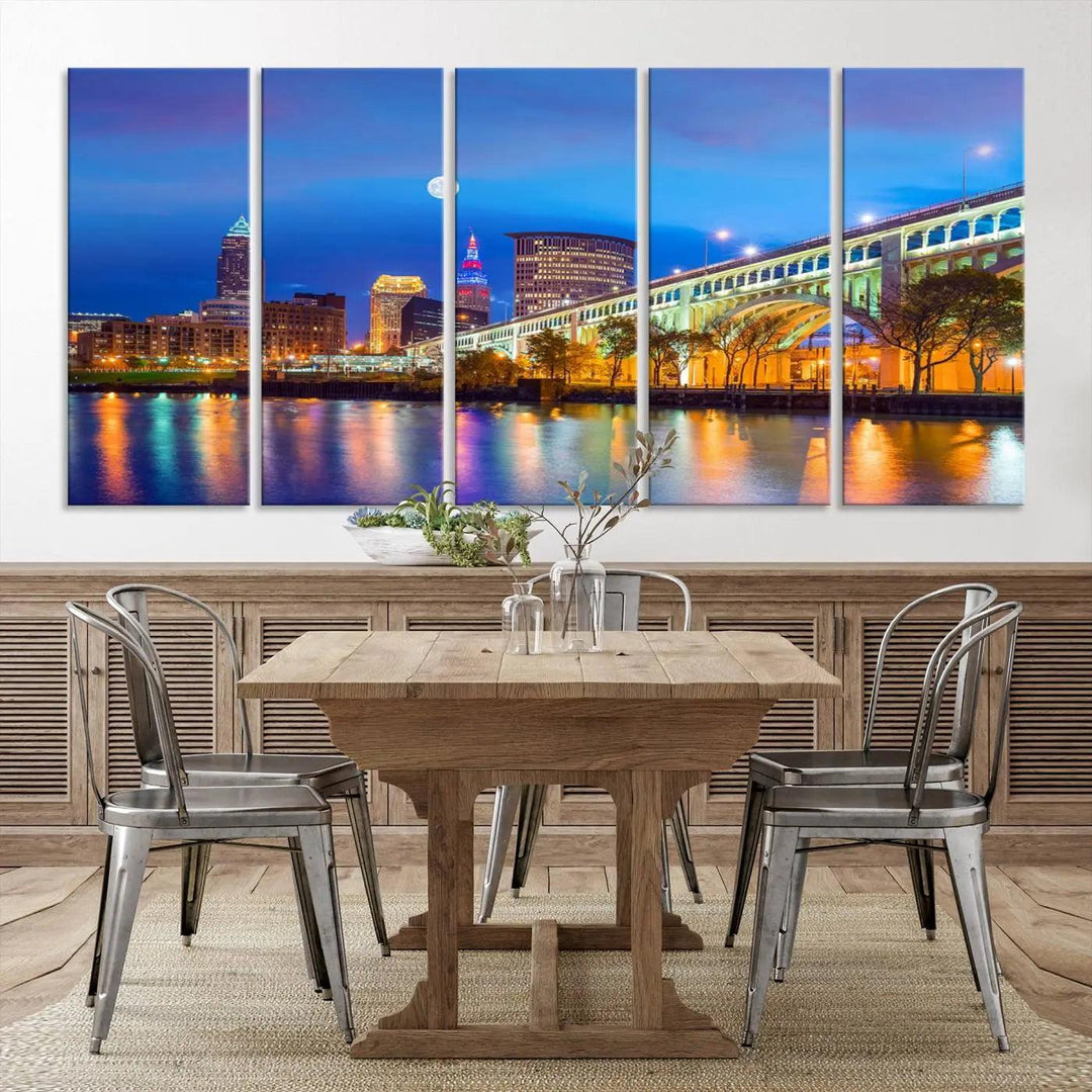 The Cleveland Night Skyline Wall Art City Cityscape Canvas Print portrays a city skyline and bridge lit up against the night sky. This artwork is printed on museum-quality canvas with a gallery-wrapped finish and features a UV-protective coating to ensure lasting vibrancy.