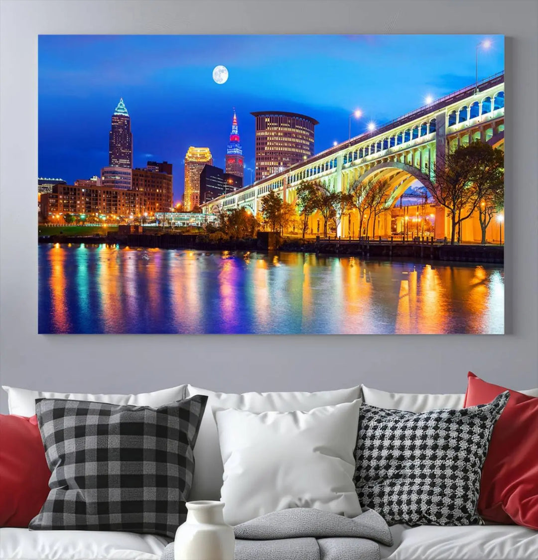 The living room features the "Cleveland Night Skyline Wall Art City Cityscape Canvas Print" prominently displayed, ready to hang.