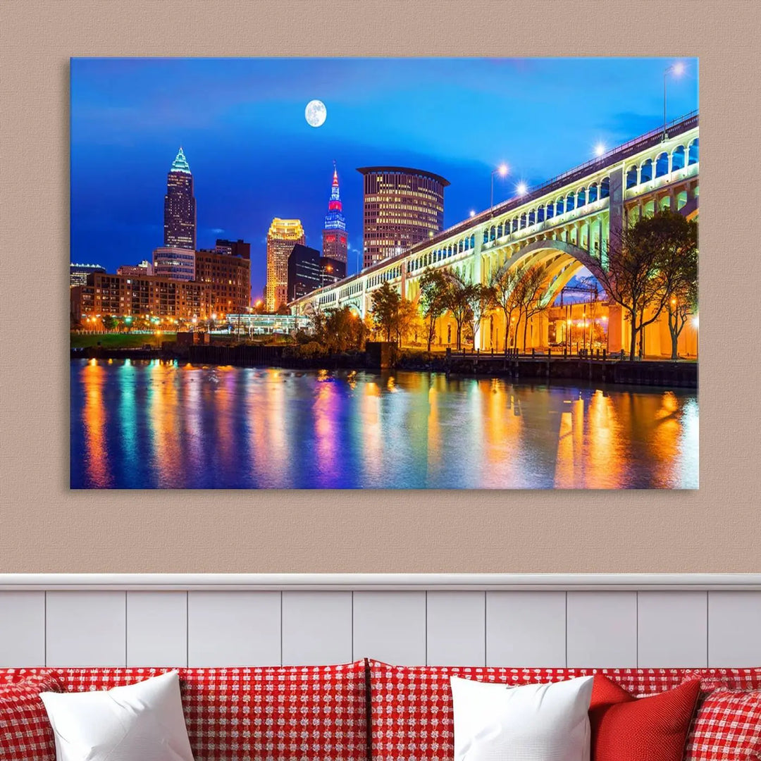 The living room features the "Cleveland Night Skyline Wall Art City Cityscape Canvas Print" prominently displayed, ready to hang.