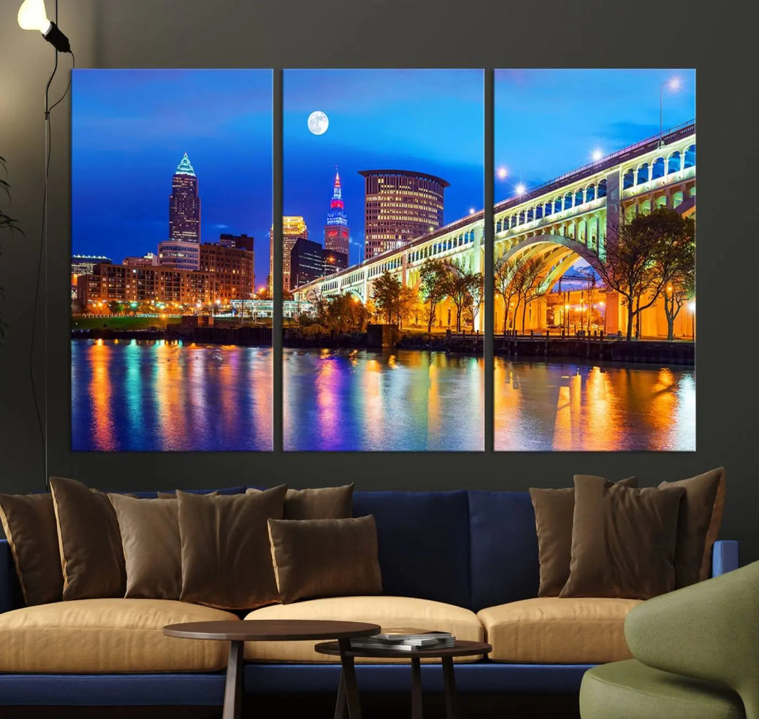 The living room features the "Cleveland Night Skyline Wall Art City Cityscape Canvas Print" prominently displayed, ready to hang.