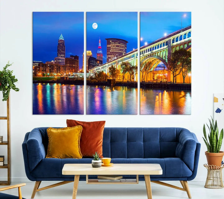 The living room features the "Cleveland Night Skyline Wall Art City Cityscape Canvas Print" prominently displayed, ready to hang.