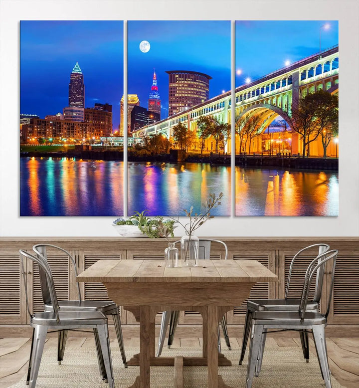 The living room features the "Cleveland Night Skyline Wall Art City Cityscape Canvas Print" prominently displayed, ready to hang.