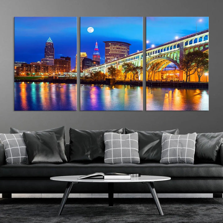 The living room features the "Cleveland Night Skyline Wall Art City Cityscape Canvas Print" prominently displayed, ready to hang.