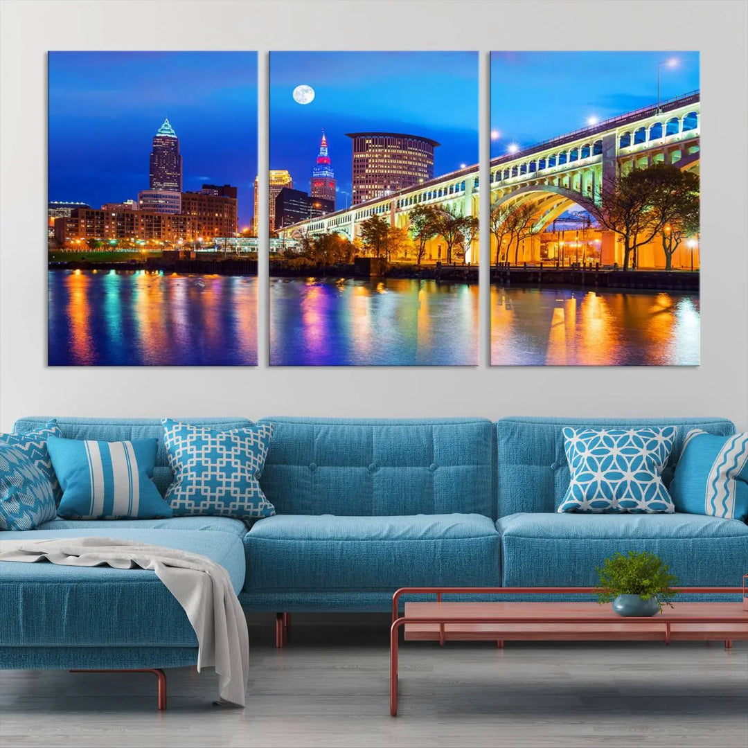 The living room features the "Cleveland Night Skyline Wall Art City Cityscape Canvas Print" prominently displayed, ready to hang.